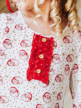 This St. Nick everyday play dress features scattered St. Nick faces across a soft white background. Designed with classic charm and sweet details, this girls’ St. Nick dress is ideal for family photos, lounge and play. The soft, lightweight fabric ensures all-day comfort, while the twirl-worthy skirt adds a playful touch. A must-have addition to her holiday wardrobe!